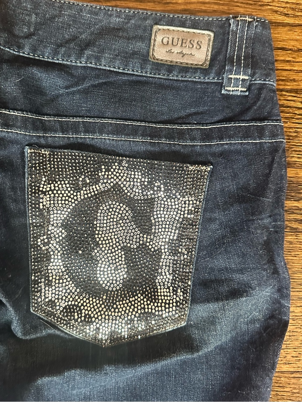 Guess bedazzled Dark wash low rise skinny jeans . Size 31